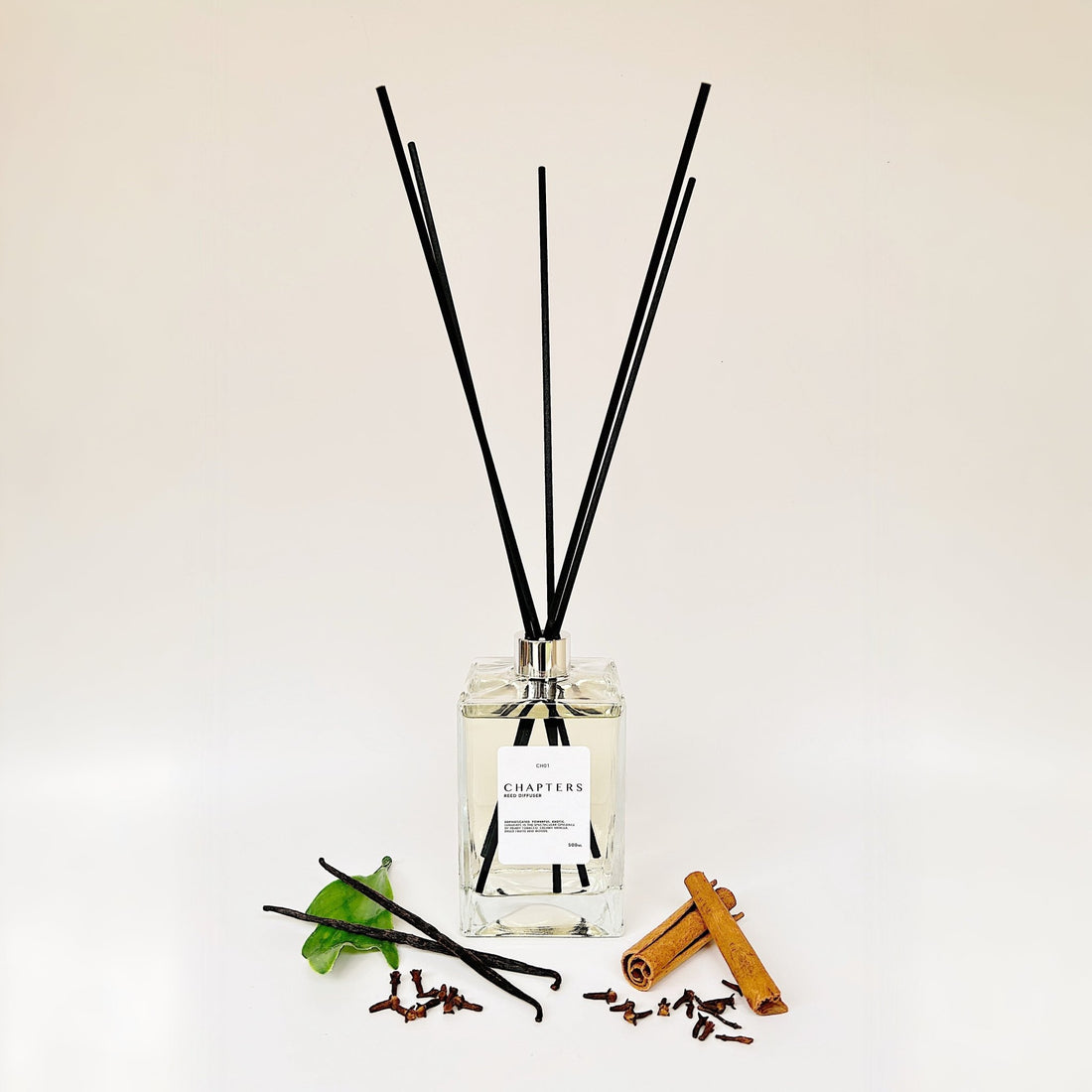 CH01 Deluxe Reed Diffuser with black reeds and spicy amber tones