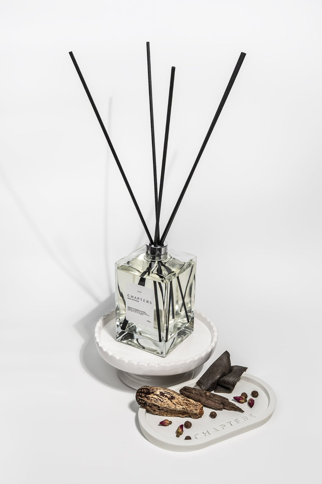 CH02 Deluxe Reed Diffuser with black reeds and floral amber styling